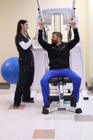 physical trainer with patient